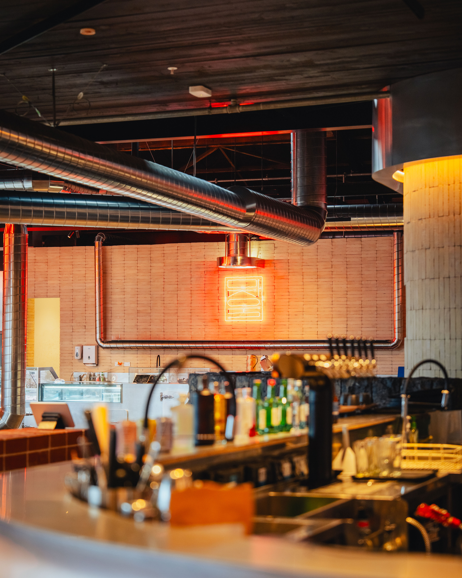 The bar, lit the way the room is lit