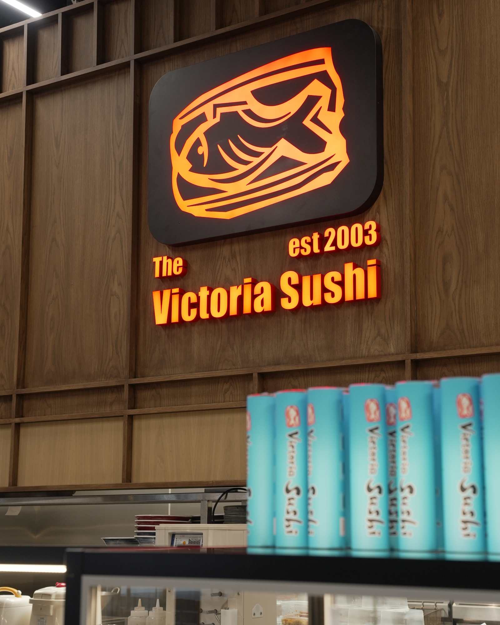 The Victoria Sushi sign above the counter at 50 Albert Street