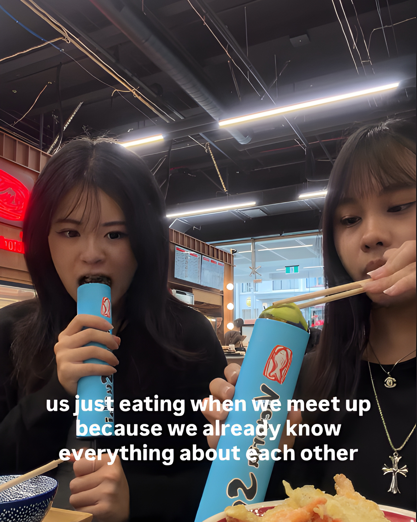 Creators eating push-up sushi in store, from the launch campaign